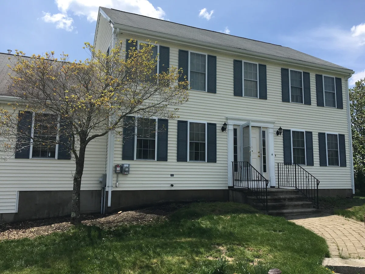 Freshly pressure-washed colonial home exterior in Worcester County, MA — Pro Pressure Washing